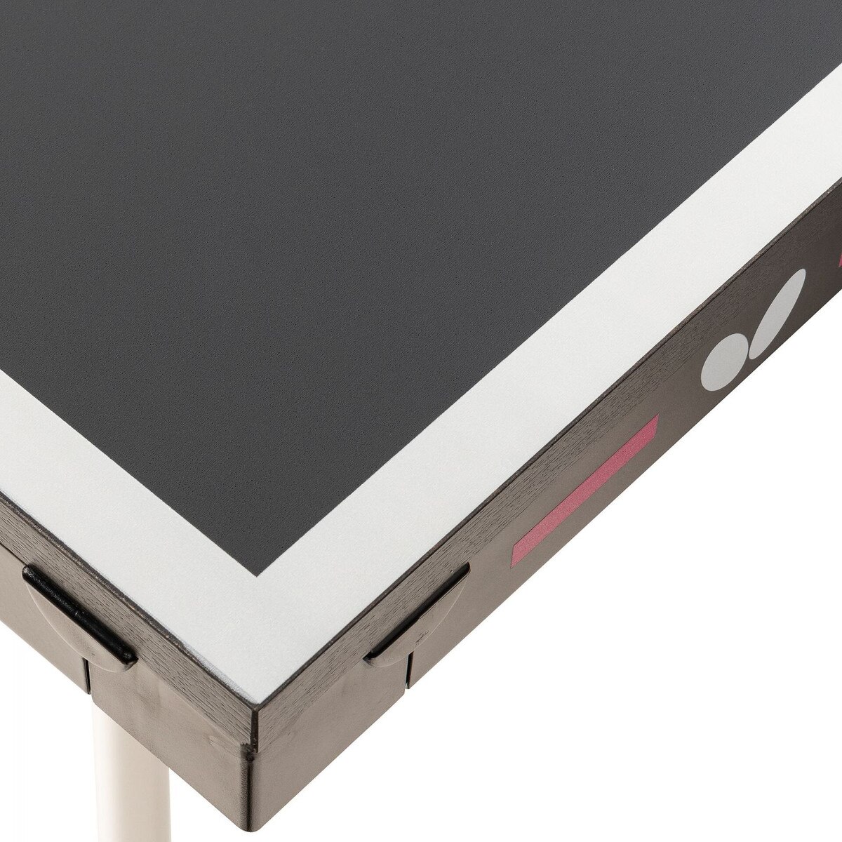 This corner detail of the Butterfly Timo Boll Repulse Indoor Ping Pong Table shows the Butterfly logo printed on the sides of the table.